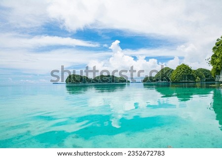 Calm lagoon and reflection. UNESCO world heritage site Rock islands southern lagoon, Palau, Pacific Royalty-Free Stock Photo #2352672783