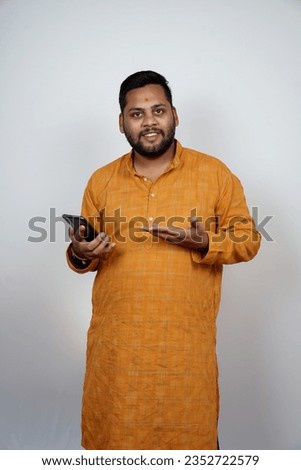 young man using smart phone cellphone for calls, social media, mobile application online isolated in white background              