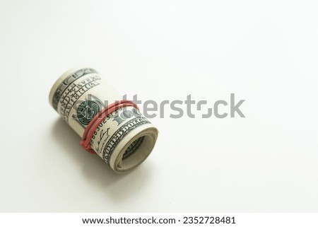Money roll dollars usa on white background. Financial concept