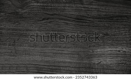 dark black melamine wood texture use as background. abstract rough wood material for interior finishing, furnishing works. wood texture with natural pattern for inner design and background. Royalty-Free Stock Photo #2352743363
