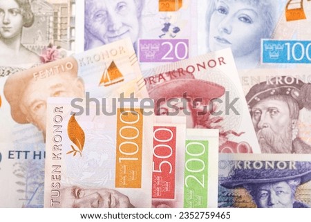 Swedish money - krona a business background Royalty-Free Stock Photo #2352759465