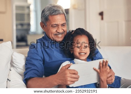 Old man, kid and tablet, cartoon and relax together on sofa, bonding with online streaming and connection. Love, care and grandfather with child and technology, subscription and watch video or film