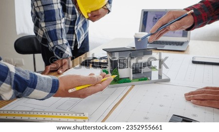 Construction and structural concept of engineer working at blueprints meeting for project working with partner in modeling and engineering tools in workplace, construction concept