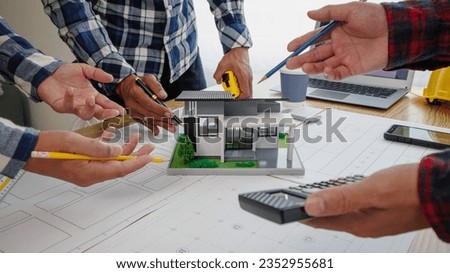 Construction and structural concept of engineer working at blueprints meeting for project working with partner in modeling and engineering tools in workplace, construction concept
