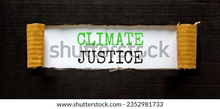 Climate justice symbol. Concept words Climate justice on beautiful white paper. Beautiful black paper background. Business environment climate justice concept. Copy space.