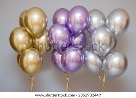 chrome balloons in the birthday room Royalty-Free Stock Photo #2352982449
