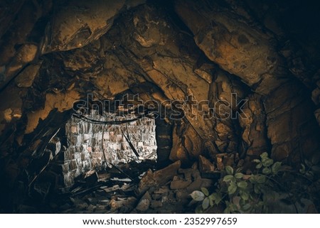 Abandon vintage quarry on a montain with some ruins of mechanism left over, Cymru, Wales, UK Royalty-Free Stock Photo #2352997659