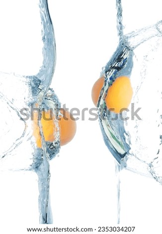 Ping Pong ball falls into water and creates air bubbles on surface. PingPong Table Tennis orange ball drop hit smash to clear water and deep to bubble. White background isolated freeze motion Royalty-Free Stock Photo #2353034207