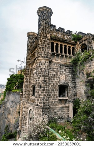 Glimpse of the twentieth-century Villa Ebe, also known as Pizzofalcone Castle, at the top of the Pizzofalcone Ramp on Mount Echia, Naples Royalty-Free Stock Photo #2353059001