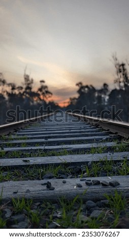 Picture of a rail tracks at the sunset