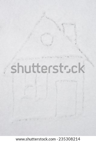 Drawing house on snow, drawing on the snow, drawing art created on the surface of the snow