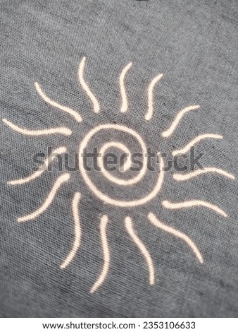 Indonesia Traditional batik with the name of the Sun motif in white and black on a gray background Royalty-Free Stock Photo #2353106633