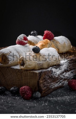 Dessert with powdered sugar and berries