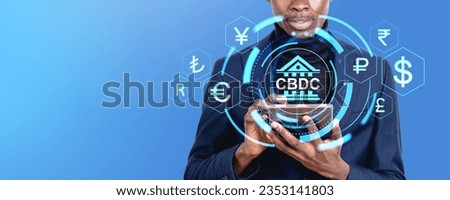 Black businessman working with tablet, CBDC hud hologram with digital glowing countries currency symbols. Concept of mobile banking, blockchain and finance