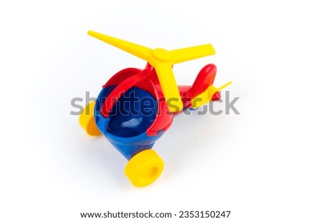 Toy children's helicopter on a white background