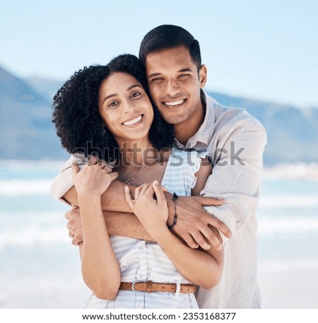 Happy, couple and portrait on beach in Brazil for holiday, vacation or travel for summer break at the ocean, waves or sea. People, smile and hug on tropical adventure together for marriage or love