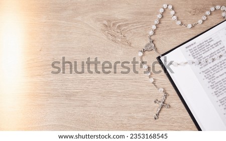 Rosary, table or bible study for faith, studying religion and mindfulness with holy spiritual scripture. Christian literature, background or story for education or knowledge on God or Jesus Christ