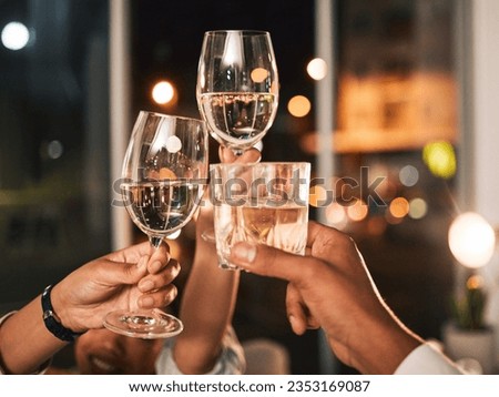 Cheers, wine and glasses with hands and business people at night, celebration of deadline target with collaboration. Alcohol drink, party and winning, toast and overtime with working late and meeting Royalty-Free Stock Photo #2353169087