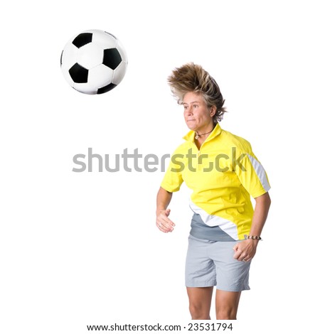 Full isolated picture of a  caucasian woman playing soccer