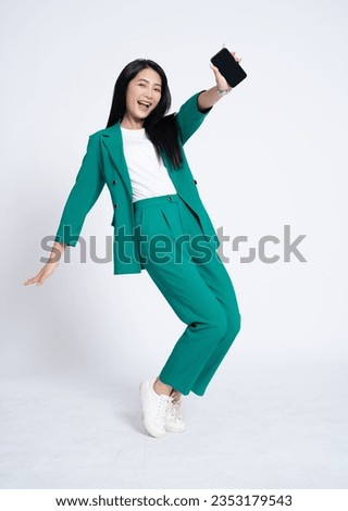 Portrait of young Asian business woman on white background Royalty-Free Stock Photo #2353179543