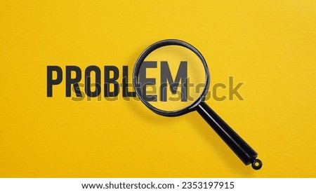 Identify the problem is shown using the text and photo of the magnifying glass. Royalty-Free Stock Photo #2353197915