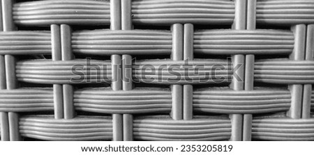 background of a woven pattern made of plastic material with monochrome color 