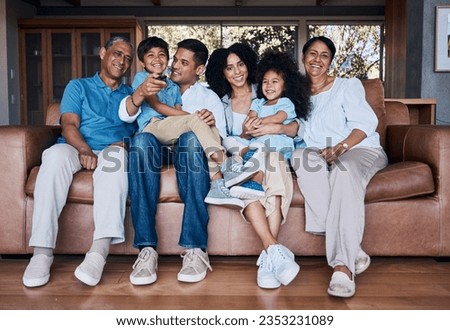 Portrait, watching tv and relax with big family on sofa for streaming, movie or smile. Love, generations and grandparents with parents and children in living room at home for subscription and embrace
