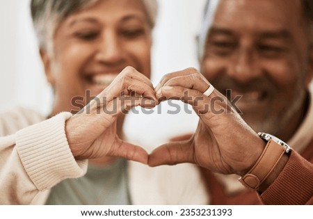 Heart, hands and happy senior couple with love, thank you sign or healthy gesture in their home together. Care, shape and old people show emoji frame in support of marriage, trust or retirement