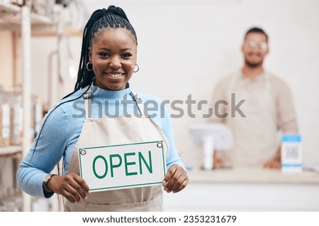 Open, sign or black woman with small business or restaurant happy for service in coffee shop, cafe or store with board. Smile, manager and portrait of entrepreneur ready for operations with billboard