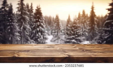 The empty wooden dark brown rustic table top with blur background of winter forest in finland. Exuberant image.