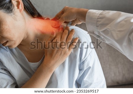 Shoulder stiff,  neck pain, and muscle ache from office syndrome in woman patient having  physiotherapy, consulting with physiotherapist, physical therapist or chiropractor  Royalty-Free Stock Photo #2353269517