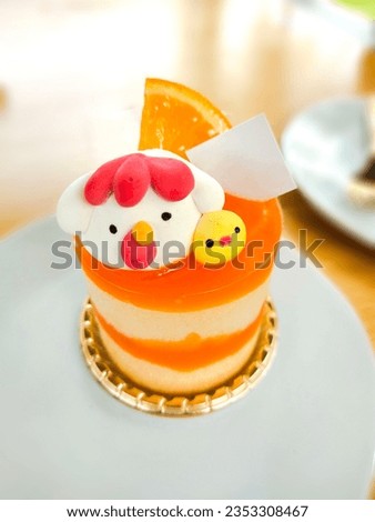 Cute cartoon orange cakes are arranged and ready to be served.