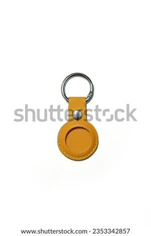 AirTag Leather Key Holder Golden Brown  Royalty-Free Stock Photo #2353342857