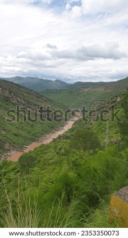 Beautiful view of river between green mountains