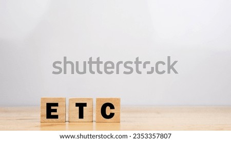 Wood cube stack alphabet ETC on white background.
Latin et cetera abbreviation concept Royalty-Free Stock Photo #2353357807