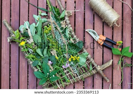 Decorative panel of herbs and plants. Picture woven from cut branches of plants and herbs. Gardenotherapy. Plant weaving. Handmade. mental health, recreation, hobby. DIY
