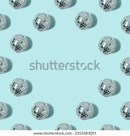 Disco ball on blue background with copy space. Minimal party concept.