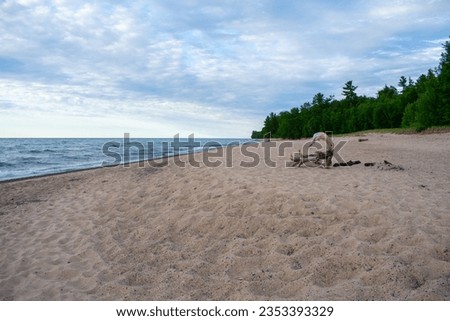 Amazing view of Lake Superior and Miner's Beach at Pictured Rocks National Lakeshore in Michigan UP. This is a huge natural attraction in Pure Michigan's Up North. Vacation perfect scene.