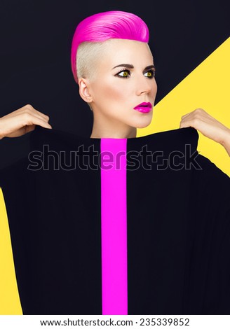 Exclusive Fashion photo. Model with trendy Hairstyle. Colored ?air
