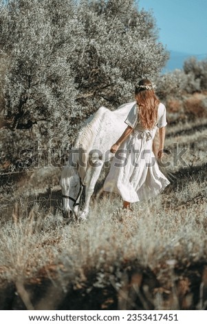 White horse, girl with a white horse