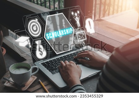 Scholarship concept, Person worjing on laptop computer with scholarship icon on virtual screen. 