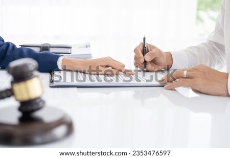 Male customer write signature on contract meeting lawyer solicitor, businessman client buyer ready to sign employment insurance sale purchase employment agreement concept make deal, close up view
