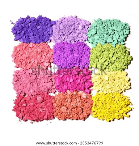 Set of bright colorful eye shadows, top view crushed swatches of makeup powder, multicolor eyeshadow palette, broken powder texture close up. Female cosmetics and beauty product, isolated on white