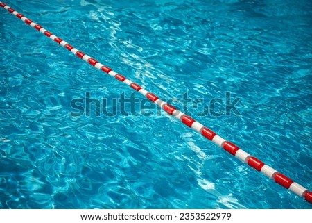 Sport swimming pool water surface nobody in water Royalty-Free Stock Photo #2353522979