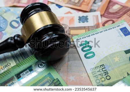 Judge hammer above  euro banknotes money. Bribe concept. The law or legel idea Royalty-Free Stock Photo #2353545637