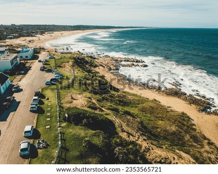 Aerial view of a beach with white sand in a sunny day in Rocha department in the coast side of Uruguay Royalty-Free Stock Photo #2353565721