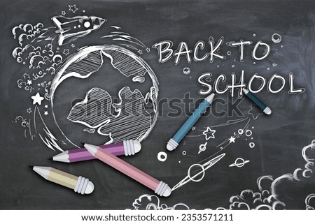 Creative back to school sketch with pencils and rocket on blackboard wall texture. Education and knowledge concept