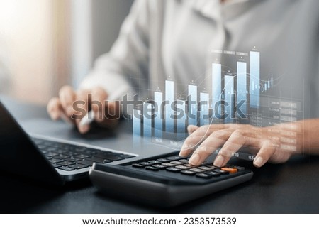 Businesswoman use laptop and tablet analyzing company growth, future business growth arrow graph, development to achieve goals, business outlook, financial data for long term investment. Royalty-Free Stock Photo #2353573539