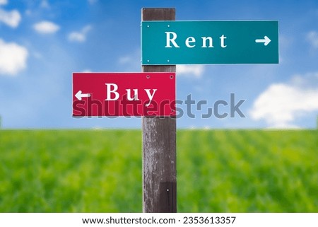 Street Sign the Direction Way to Buy versus Rent Royalty-Free Stock Photo #2353613357