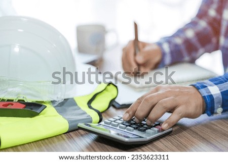 revenue calculation engineer construction costs on the desk
concept of capital analysis Recurring income and expenditure
selective focus Royalty-Free Stock Photo #2353623311